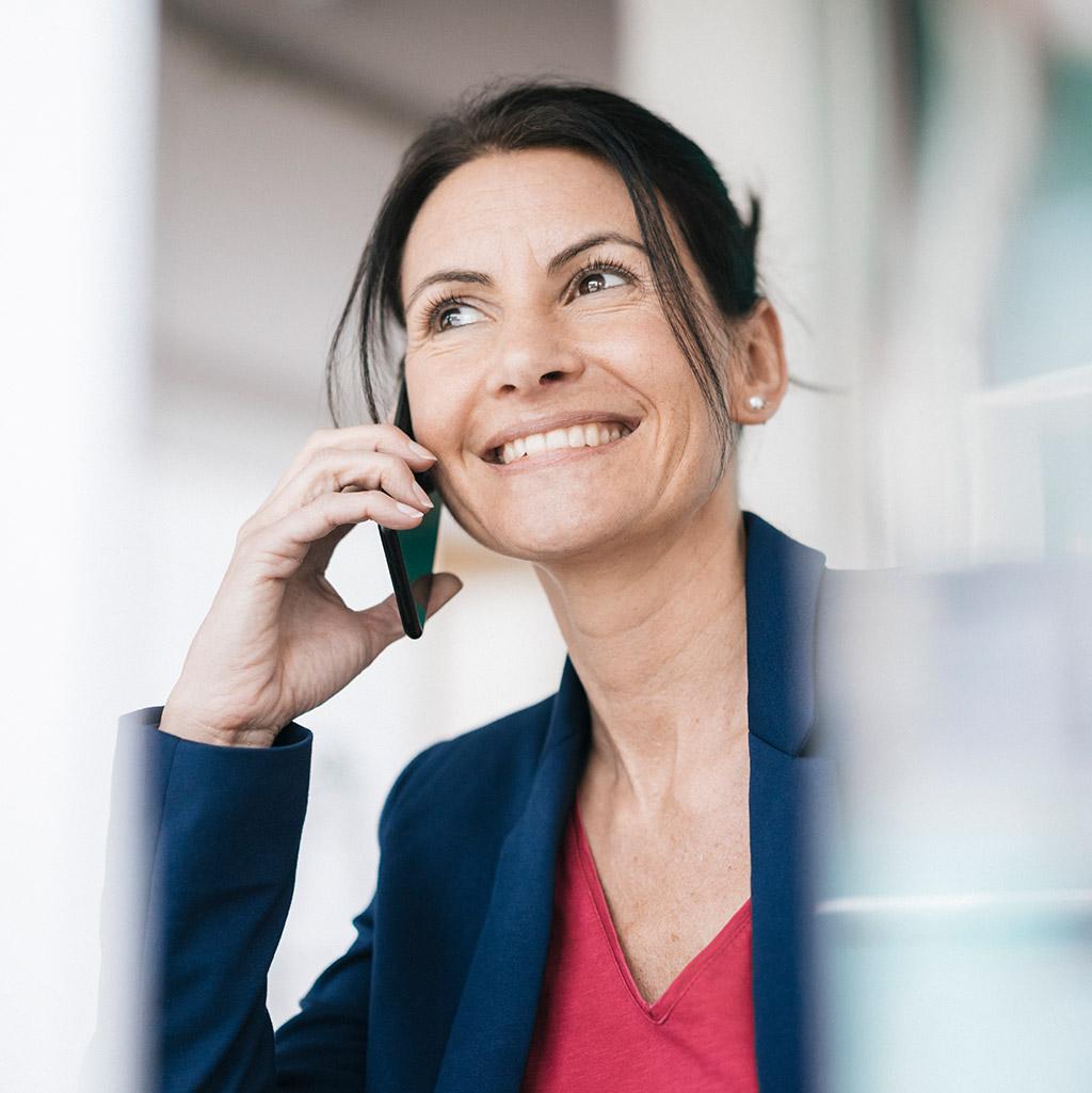 Travel Consultant on the phone speaking with a customer