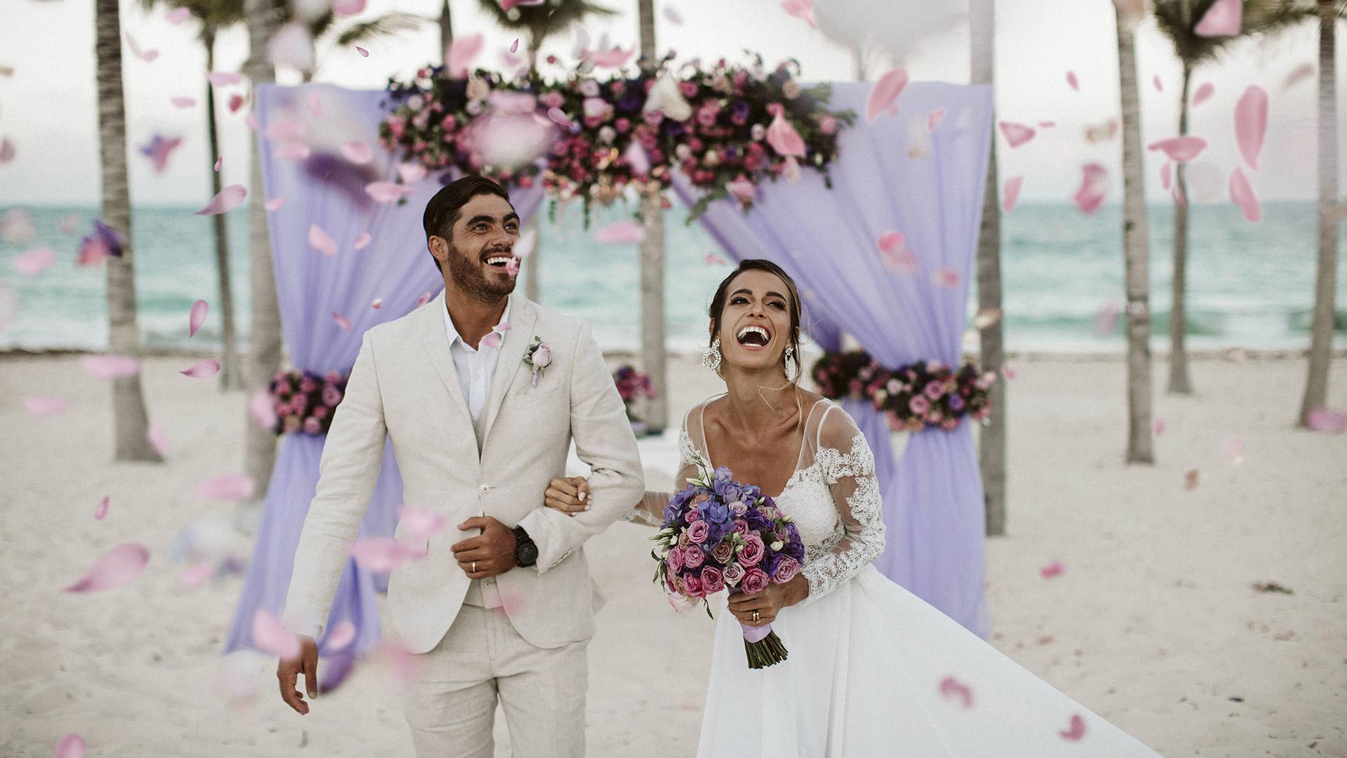 Man and woman celebrating at their wedding ceremony