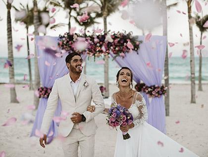 Man and woman celebrating at their wedding ceremony