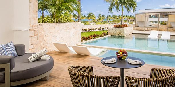 Relax on your private terrace with direct swim-up access to the pool at Majestic Elegance Costa Mujeres.