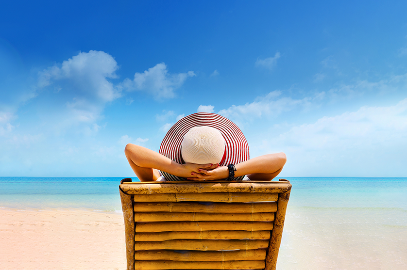 Person on the beach lounging on the beach
